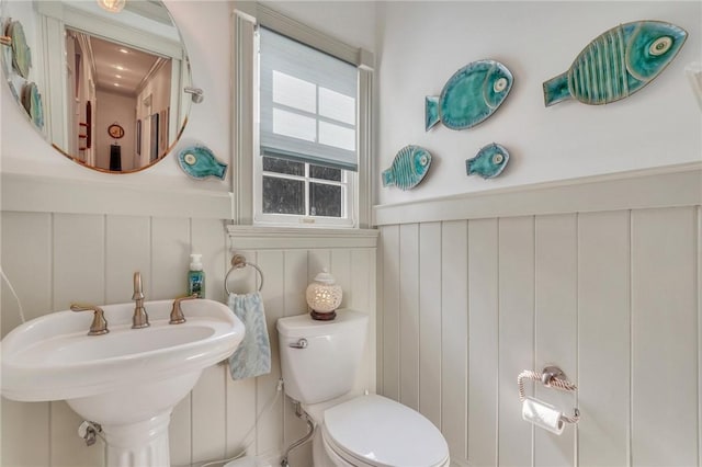 bathroom with sink and toilet