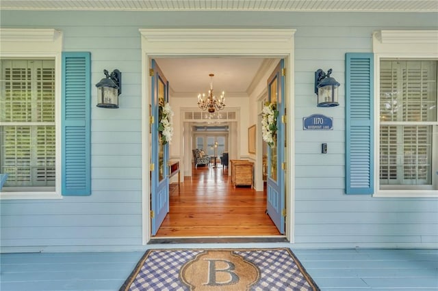 doorway to property featuring covered porch