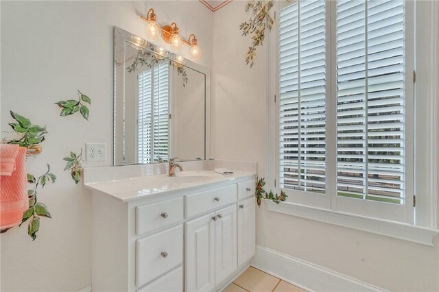 bathroom with vanity and tile patterned flooring