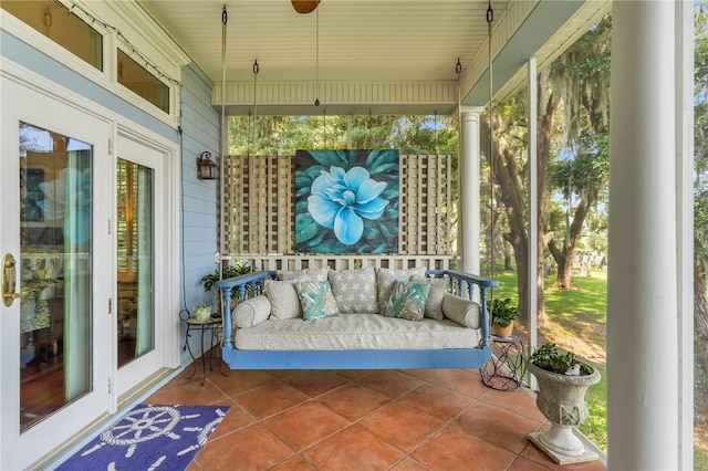 unfurnished sunroom with plenty of natural light