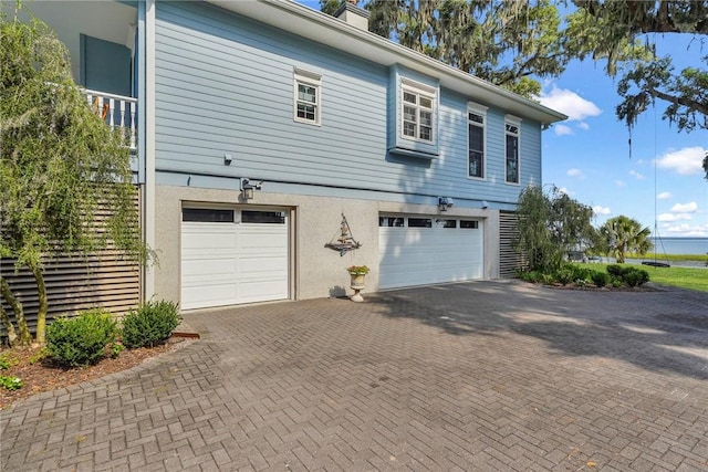 exterior space with a garage