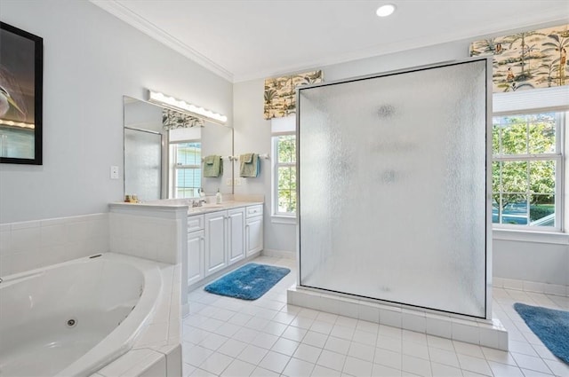 23 W Lake Dr, Saint Simons Island, GA 31522 - bathroom featuring ornamental molding, a stall shower, a tub with jets, vanity, and tile patterned floors