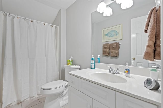 bathroom with tile patterned floors, vanity, a shower with shower curtain, and toilet