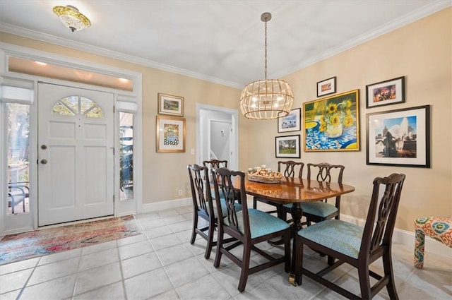 dining area featuring a notable chandelier, light tile patterned floors, and crown molding