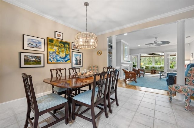 23 W Lake Dr, Saint Simons Island, GA 31522 - dining room with ornate columns, ceiling fan, crown molding, a chandelier, and light tile patterned flooring