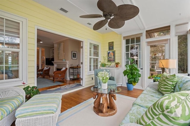 23 W Lake Dr, Saint Simons Island, GA 31522 - sunroom / solarium featuring wood finished floors