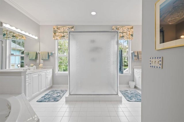 bathroom with tile patterned flooring, vanity, separate shower and tub, and ornamental molding