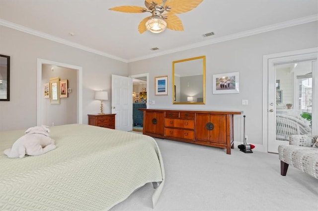 carpeted bedroom featuring ceiling fan and ornamental molding