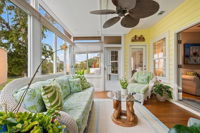 23 W Lake Dr, Saint Simons Island, GA 31522 - sunroom featuring an outdoor living space, wood finished floors, and a ceiling fan