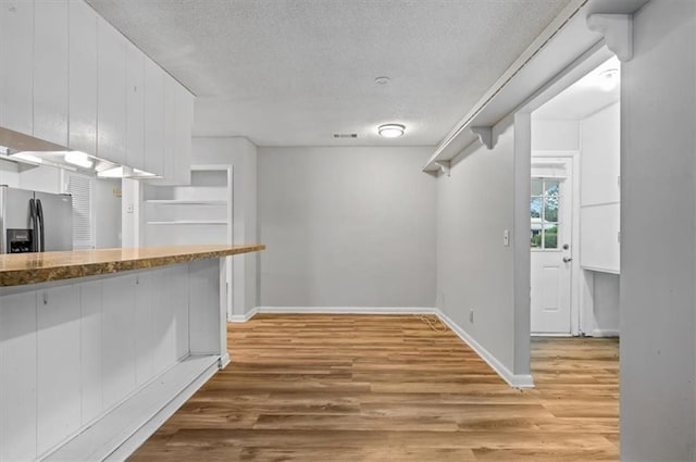 spacious closet with light wood-type flooring