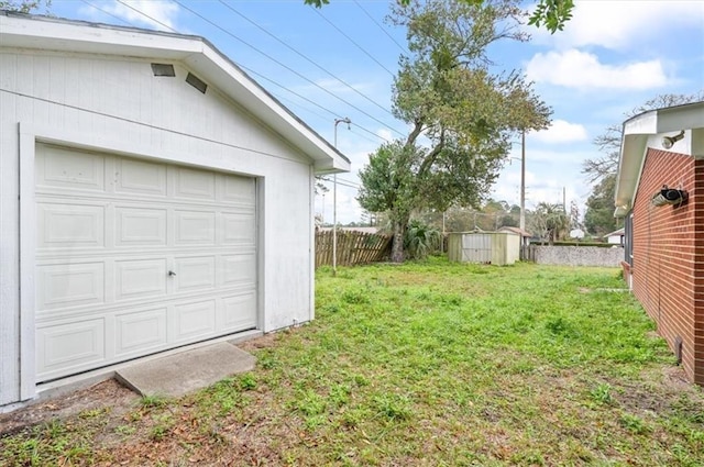 view of yard with a storage unit