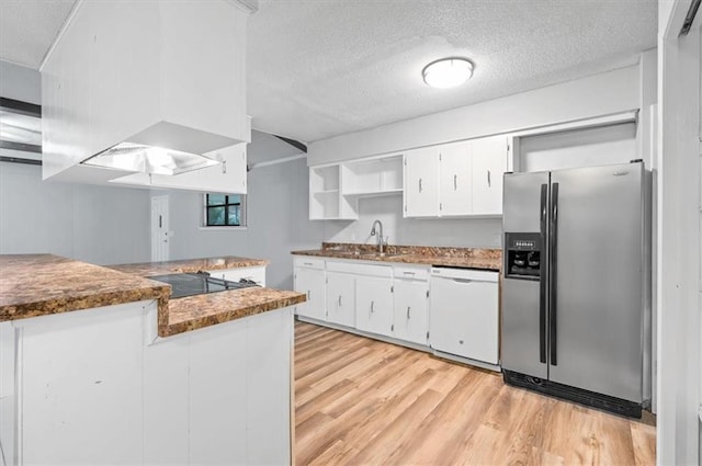 kitchen with white cabinetry, stainless steel refrigerator with ice dispenser, white dishwasher, black stovetop, and light wood-type flooring