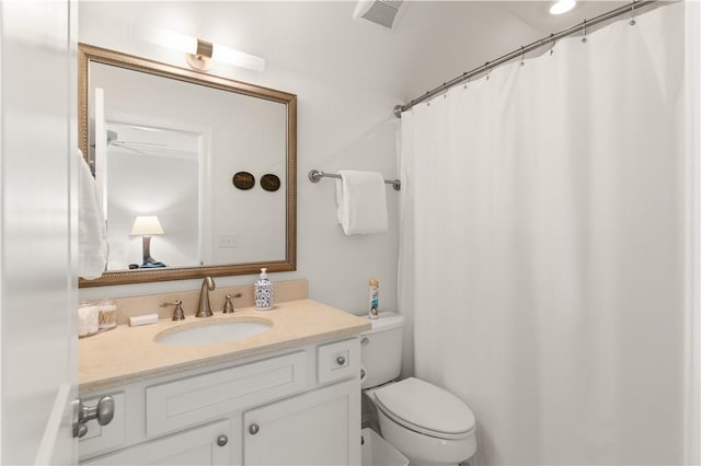 1045 Sinclair Pointe Pt, Saint Simons Island, GA 31522 - bathroom featuring vanity and a shower with shower curtain