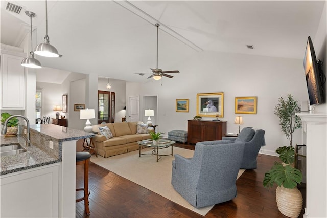 1045 Sinclair Pointe Pt, Saint Simons Island, GA 31522 - living room with lofted ceiling, dark wood-style floors, and ceiling fan