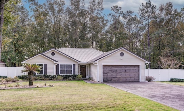 ranch-style house featuring a garage and a front lawn