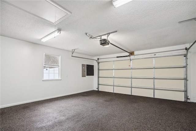 garage featuring electric panel and a garage door opener