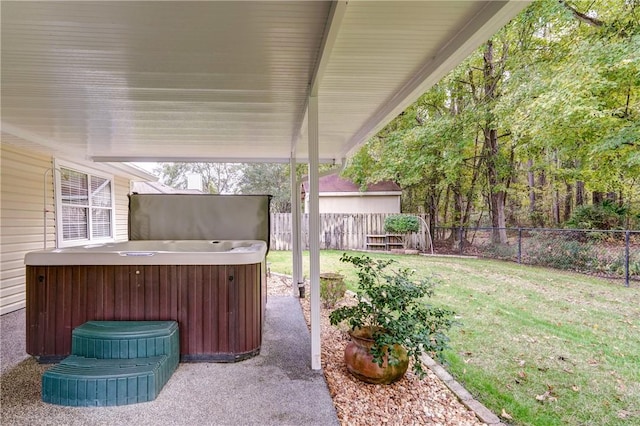 view of patio / terrace featuring a hot tub