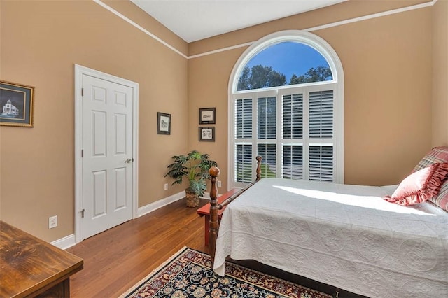 bedroom featuring hardwood / wood-style floors