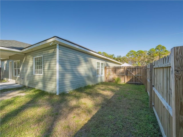 view of home's exterior featuring a lawn