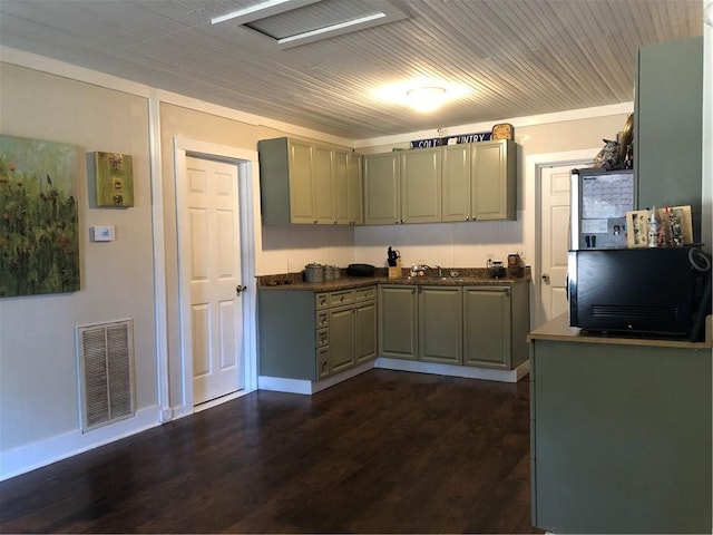 kitchen with dark hardwood / wood-style floors and sink