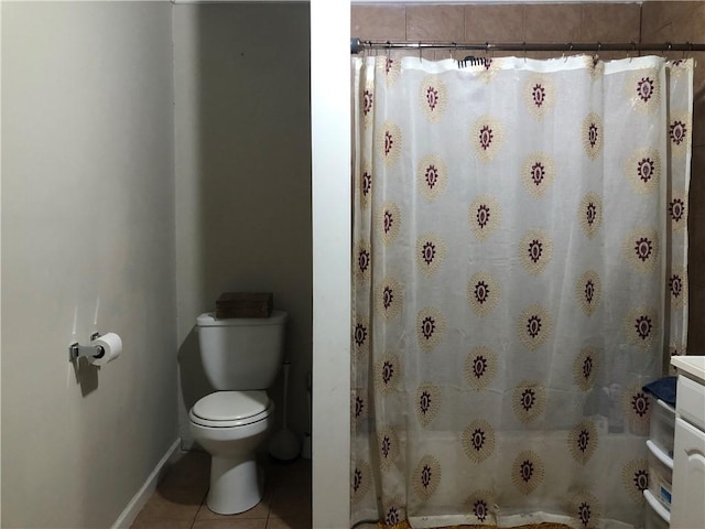 bathroom with tile patterned floors, vanity, a shower with shower curtain, and toilet