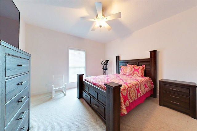 bedroom featuring light colored carpet and ceiling fan