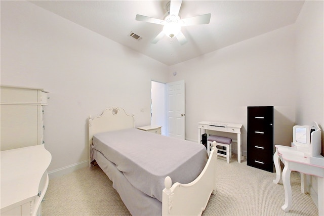 bedroom featuring light carpet and ceiling fan