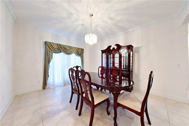 dining space with ornamental molding, a notable chandelier, and light tile patterned flooring