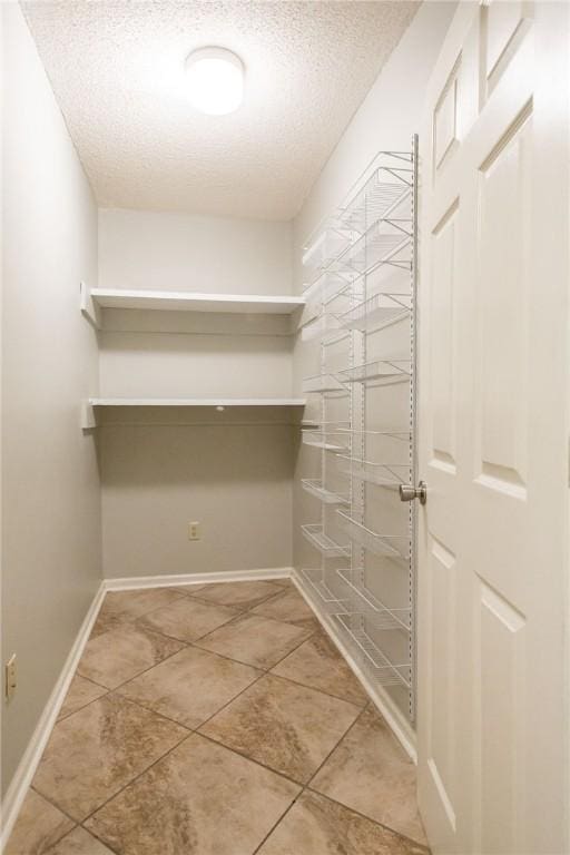 1709 Suwanne Dr, Waycross, GA 31501 - spacious closet with light tile patterned flooring