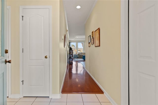 hallway featuring light tile patterned floors