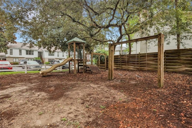 community play area featuring fence