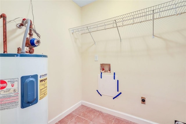 washroom with laundry area, light tile patterned floors, electric water heater, hookup for a washing machine, and hookup for an electric dryer