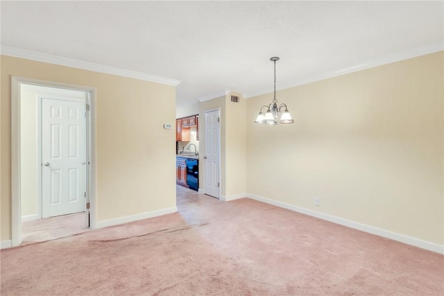 spare room featuring ornamental molding, light colored carpet, a notable chandelier, and baseboards