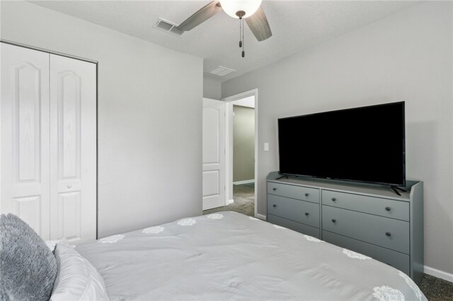 310 Brooklet Cir, Saint Marys, GA 31558 - carpeted bedroom featuring a closet, baseboards, and a ceiling fan
