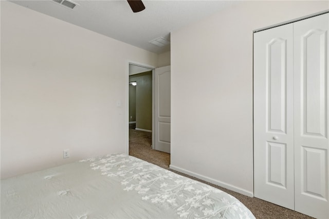 310 Brooklet Cir, Saint Marys, GA 31558 - bedroom with carpet floors, a closet, ceiling fan, and baseboards