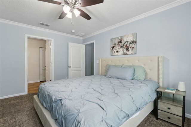 310 Brooklet Cir, Saint Marys, GA 31558 - bedroom with ornamental molding, carpet flooring, baseboards, ceiling fan, and a textured ceiling