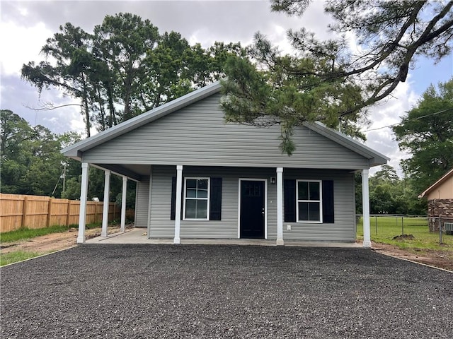 909 E Third St, Darien, GA 31305 - view of front of house with a porch