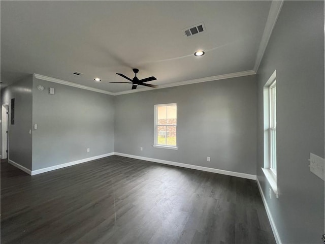 909 E Third St, Darien, GA 31305 - empty room featuring a ceiling fan, crown molding, dark wood finished floors, and recessed lighting