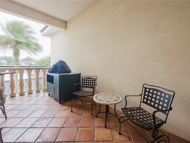 view of patio with a balcony