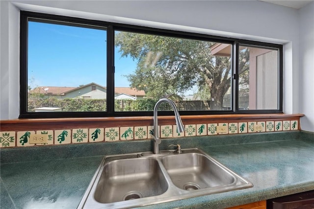 room details with dishwashing machine and sink