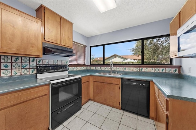 kitchen featuring dishwasher, sink, a textured ceiling, electric stove, and light tile patterned floors