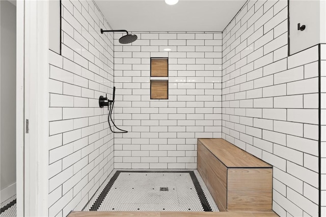 full bathroom featuring a tile shower