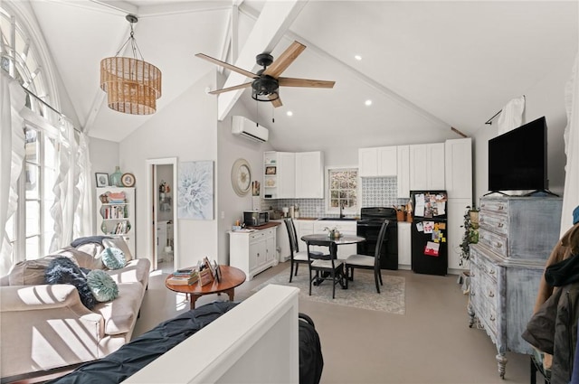 interior space with high vaulted ceiling, a wall mounted AC, recessed lighting, finished concrete floors, and ceiling fan with notable chandelier