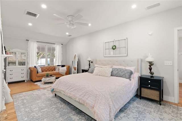 bedroom featuring recessed lighting, visible vents, and light wood finished floors