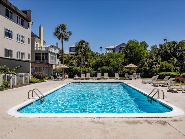 1524 Wood Ave Unit 106, Saint Simons Island, GA 31522 - community pool with fence and a patio area