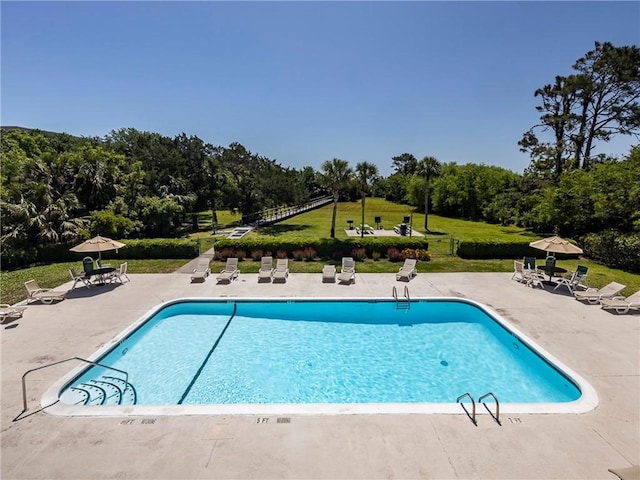 1524 Wood Ave Unit 106, Saint Simons Island, GA 31522 - pool with a yard and a patio