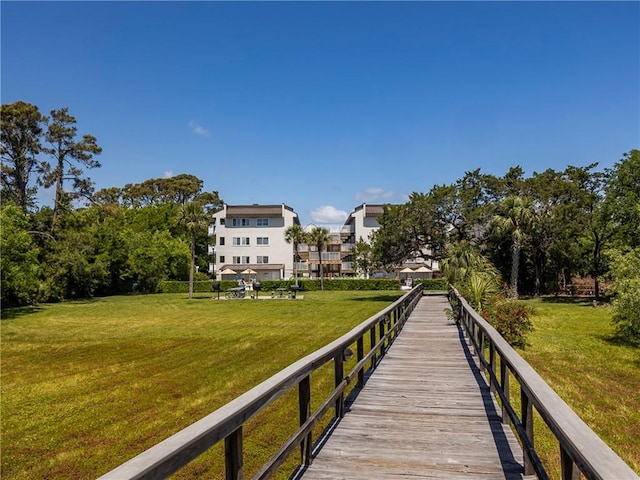1524 Wood Ave Unit 106, Saint Simons Island, GA 31522 - dock area with a lawn