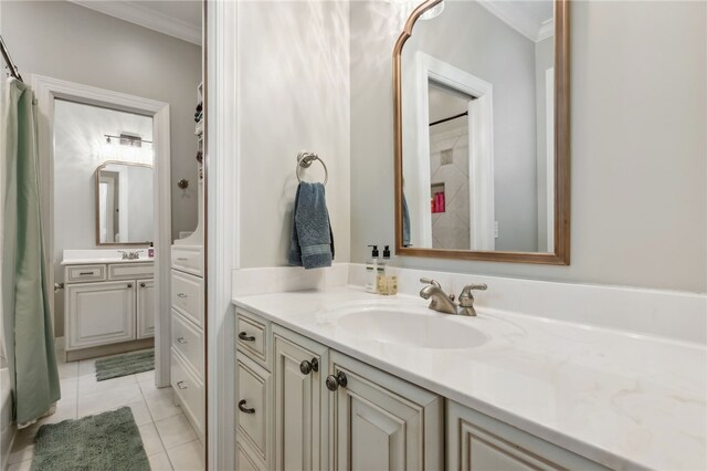 bathroom with vanity, tile patterned floors, shower / bathtub combination with curtain, and crown molding