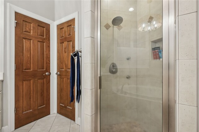 bathroom featuring tile patterned floors and walk in shower