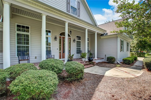 doorway to property with covered porch